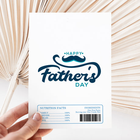 Happy Father's Day chocolate wrapper with nutrition facts panel and barcode, in hand