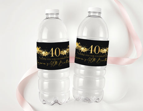 Clear water bottles with black 40th birthday label and gold star accents