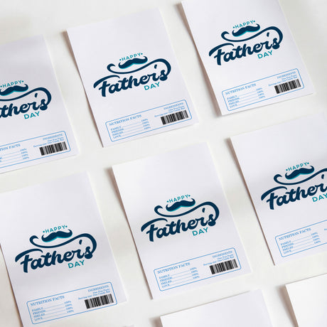 Set of Happy Father's Day chocolate wrappers with nutrition facts panels and barcodes