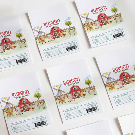 Farm animal printed chocolate wrappers with red barn and Hudson Turns Three text