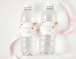 Personalised flamingo drink bottle labels on two clear bottles, name Evelyn, turning 4