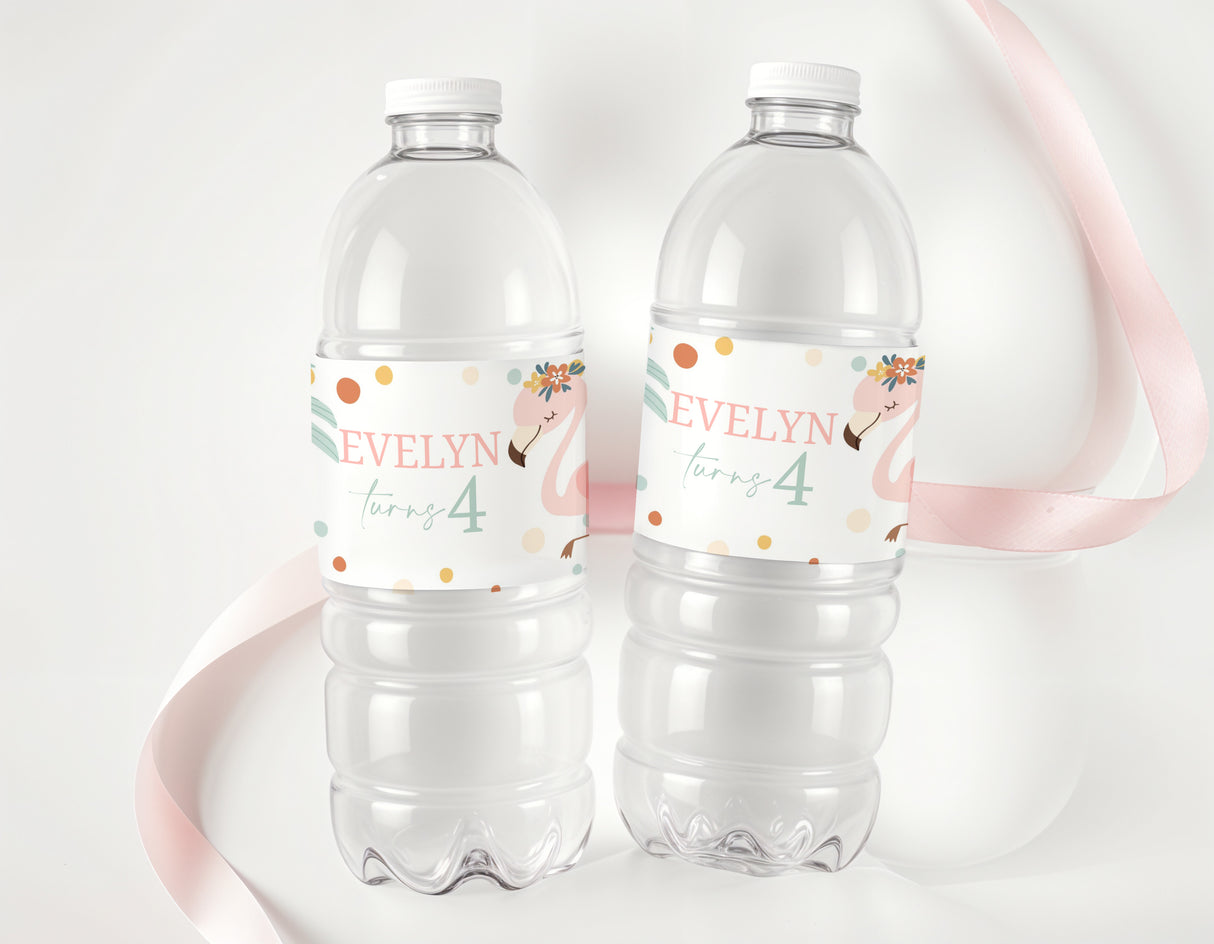 Personalised flamingo drink bottle labels on two clear bottles, name Evelyn, turning 4