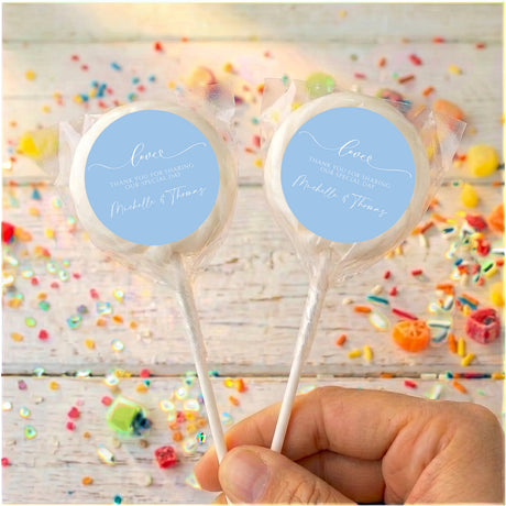 Personalised baby blue wedding lollipops with round love message labels, clear wrappers