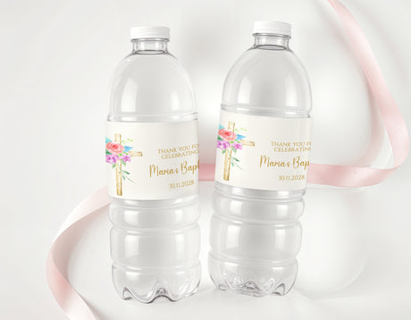 Personalised floral cross water bottle labels on two clear drink bottles