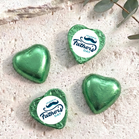 Green foil-covered chocolate hearts with Happy Father's Day labels