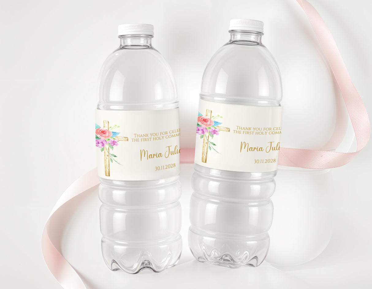 Personalised water bottle labels on clear plastic bottles with floral cross and name