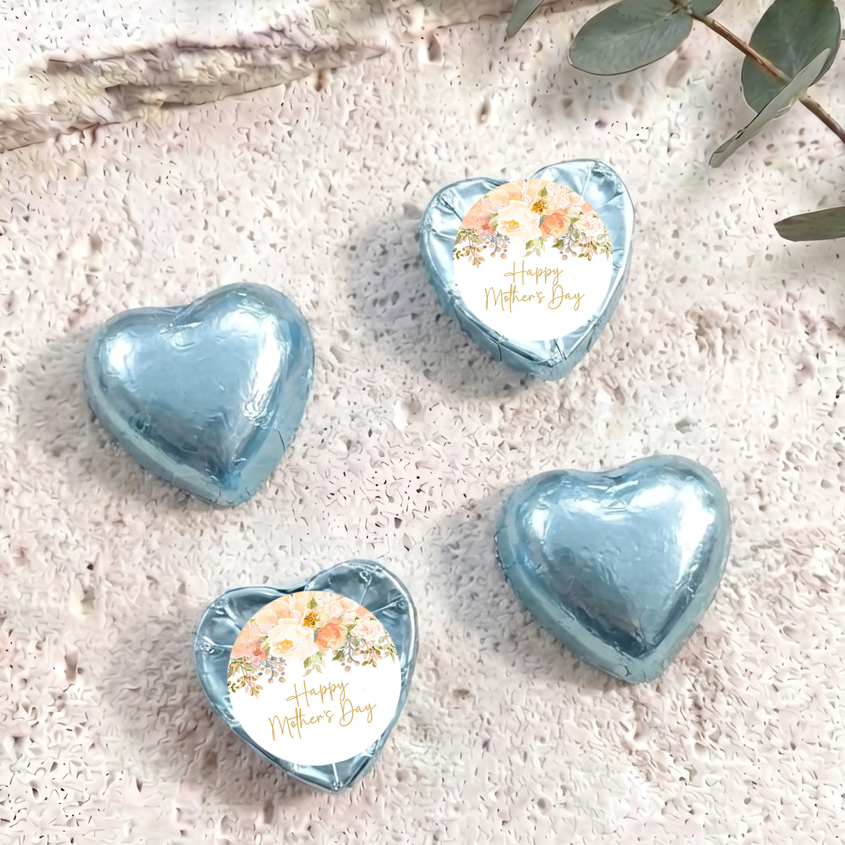 Mother's Day foil-covered chocolate hearts, light blue with floral card centers