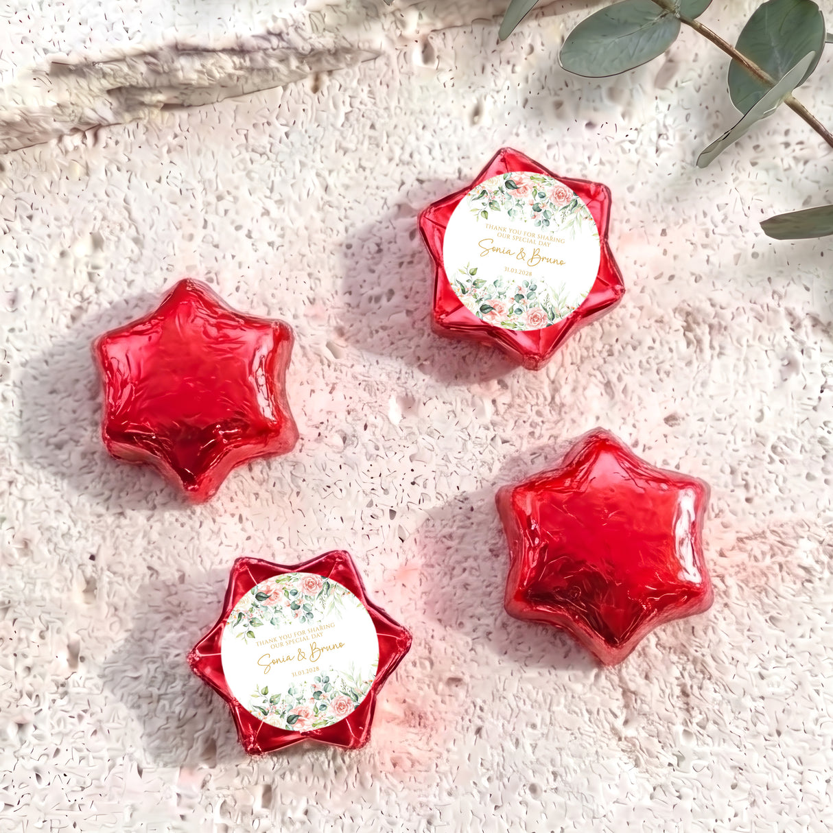 Red foil-wrapped chocolate stars with floral personalized center label (set of 5)