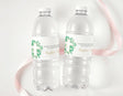 Clear plastic water bottles with green cross christening label and custom names