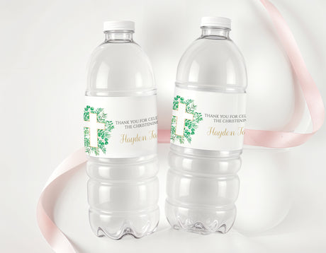 Clear plastic water bottles with green cross christening label and custom names