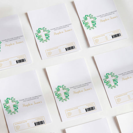Printed chocolate wrappers, white with green cross and christening text