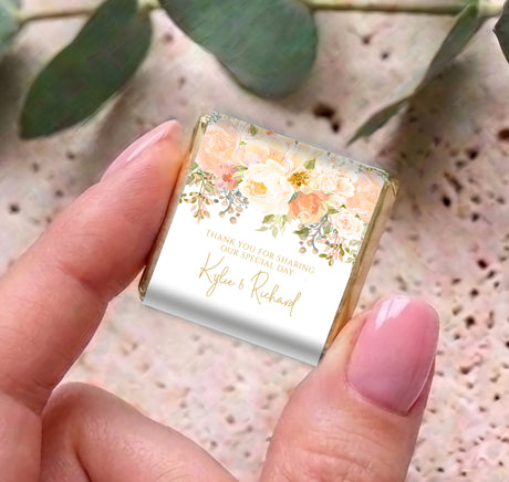 Peach cream rose mini chocolates with gold foil wrapper and thank-you personalization