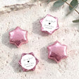 Personalised foil-covered chocolate star chocolates in pink with white event label