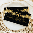 90th birthday chocolate bar wrapper, black with gold stars and “90” thank you text