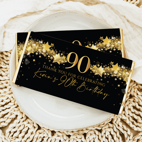 90th birthday chocolate bar wrapper, black with gold stars and '90' text