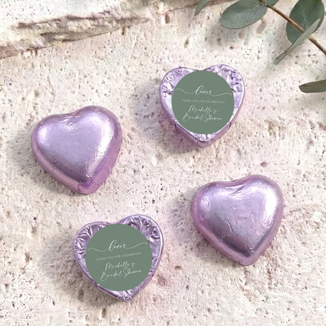 Lavender heart-shaped foil-covered chocolate hearts with round thank-you label
