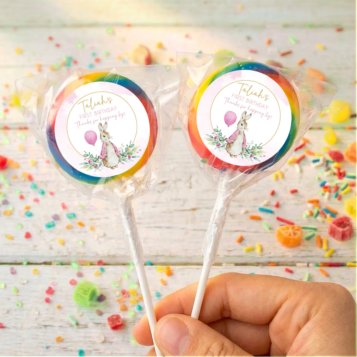 Rainbow-edged round lollipops with Peter Rabbit birthday label, personalized Talayah on sticks