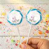 Blue round lollipops with Peter Rabbit first-birthday label for Talayah on sticks