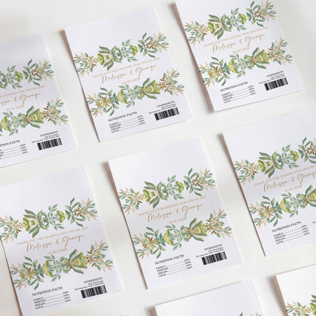 Greenery wedding chocolate wrappers with gold script, floral leaves border, barcode labels