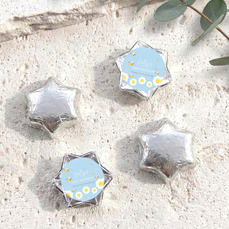 Silver foil chocolate stars with one personalised printed blue label