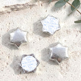 Personalized foil-covered chocolate stars in silver/white, with round label center.
