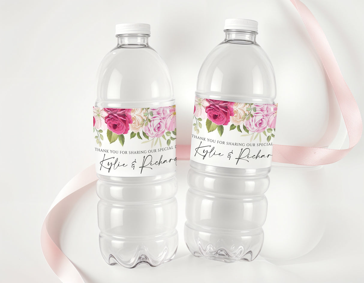 Personalised water bottle labels with hot pink floral roses on clear bottles