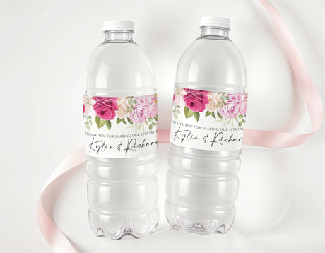 Personalised water bottle labels with hot pink floral roses on clear bottles