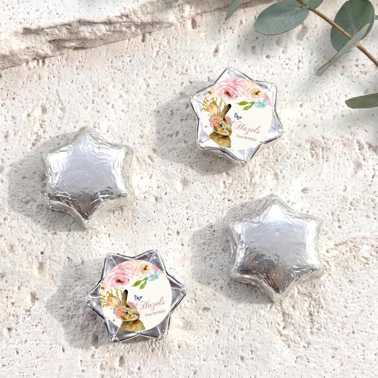 Silver foil star chocolates with floral bunny birthday label wrap