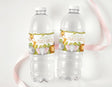 Personalised jungle drink bottle labels on two clear bottles with giraffe and elephant art
