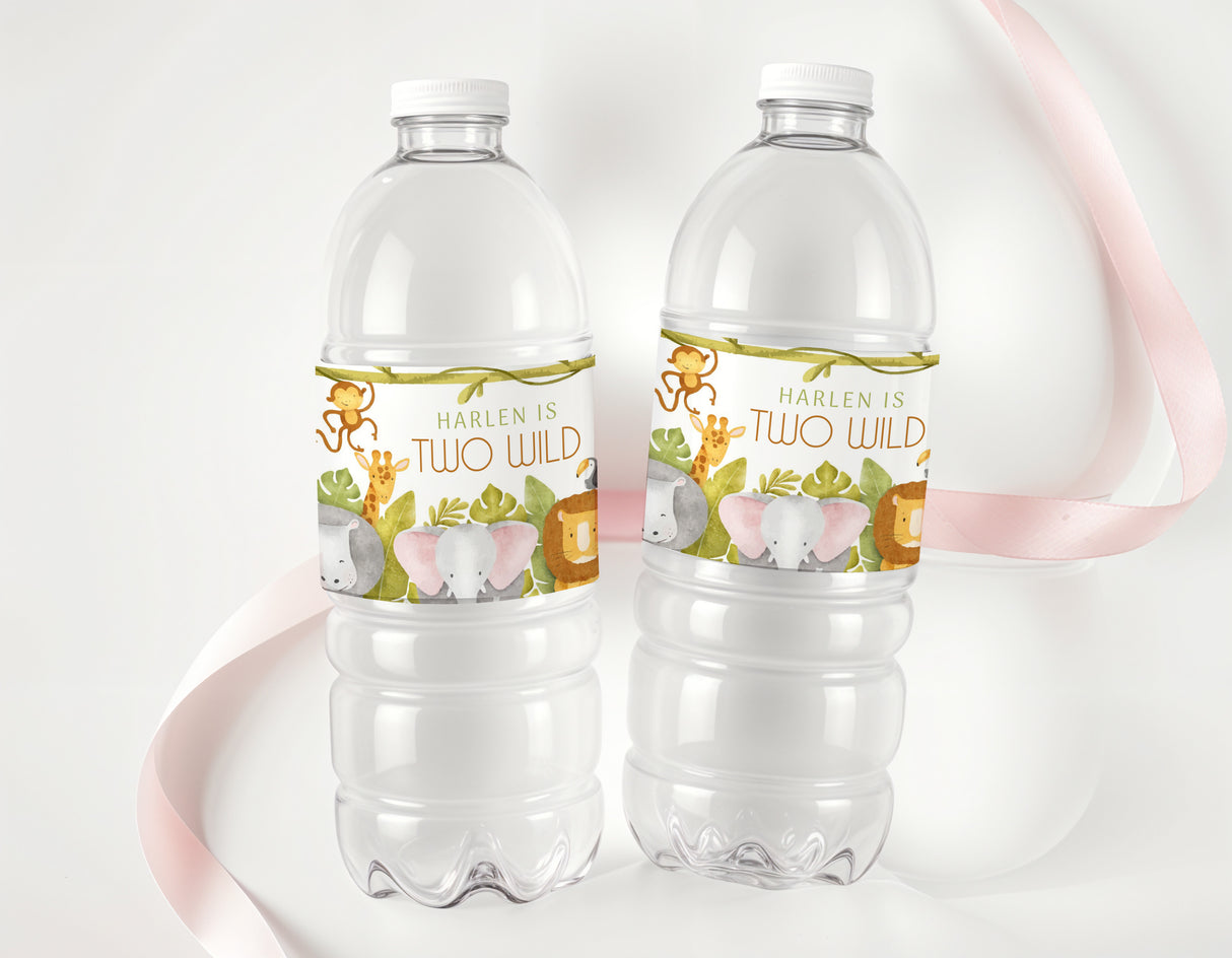 Personalised jungle drink bottle labels on two clear bottles with giraffe and elephant art