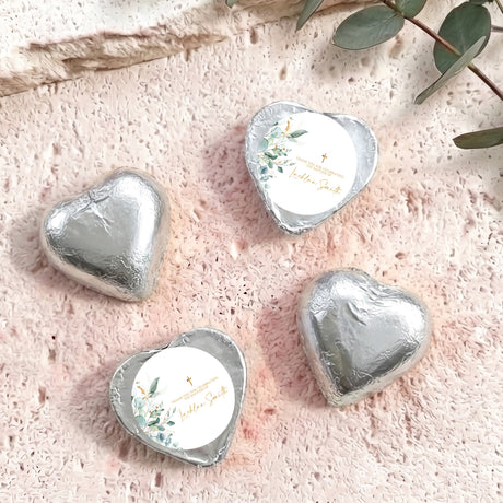 Silver foil chocolate hearts with printed label, four hearts arranged in view