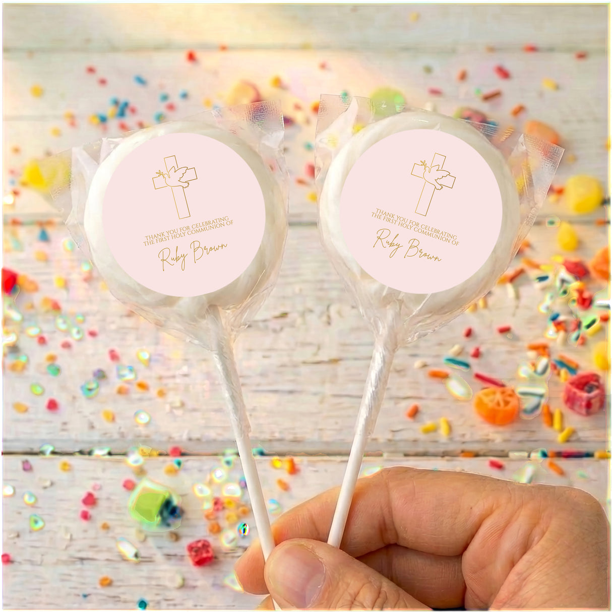 White First Holy Communion lollipops with personalized cross labels, clear wrappers