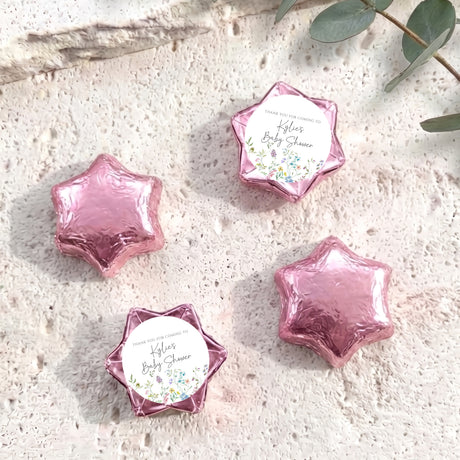 Personalised foil-covered chocolate stars, pink star-shaped chocolates with printed thank-you tags