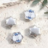 Baptism foil chocolate stars: blue floral thank-you label on silver star