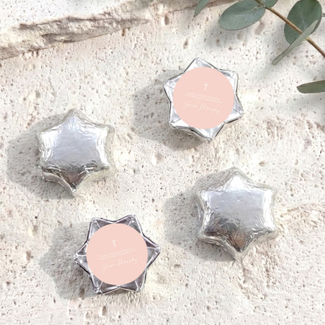 Silver foil chocolate stars with cross emblem and personalised round label