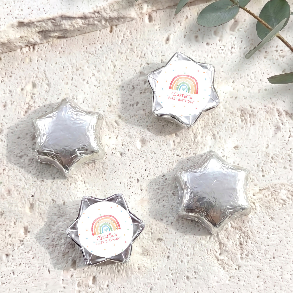Foil chocolate stars with silver and white rainbow label