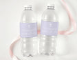 Lavender confirmation bottle labels on two clear water bottles with cross