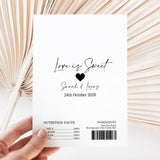 Printed chocolate wrapper with “Love is Sweet”, heart, names/date and barcode