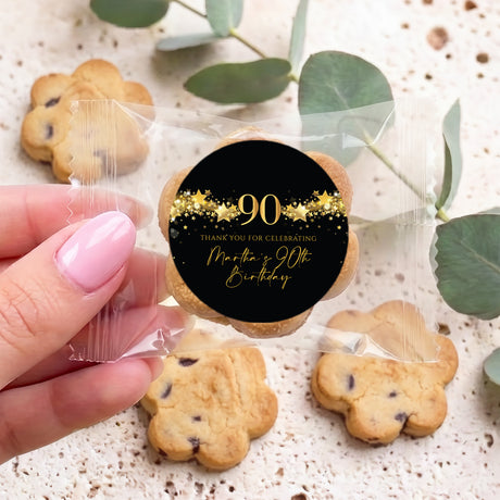 Mini cookie with black & gold 90th birthday round label: Thank you, Martha’s 90th