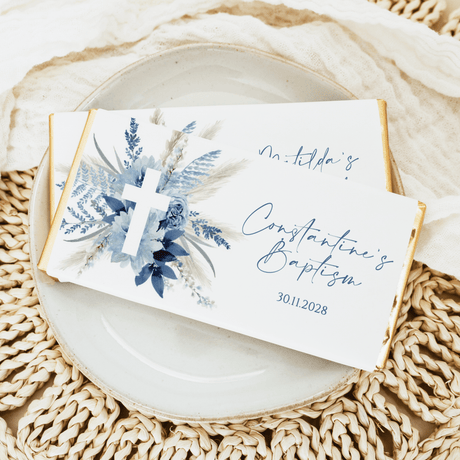 Blue boho baptism chocolate bar wrapper with blue cross, floral design, and date