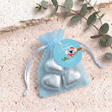 Silver-blue heart chocolates in sheer light-blue organza drawstring gift bag with label