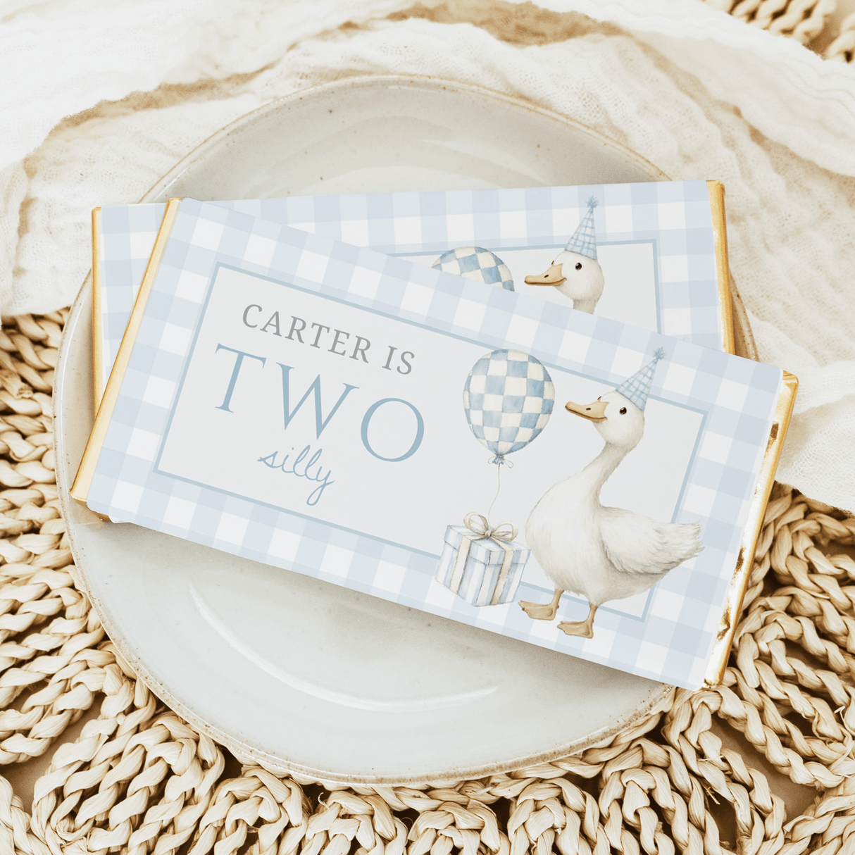 Blue birthday chocolate bar with two ducks, checkered balloons and gift box design