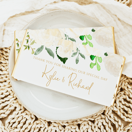 Cream rose waterfall thank-you chocolate bar wrapper with green leaves and cursive names