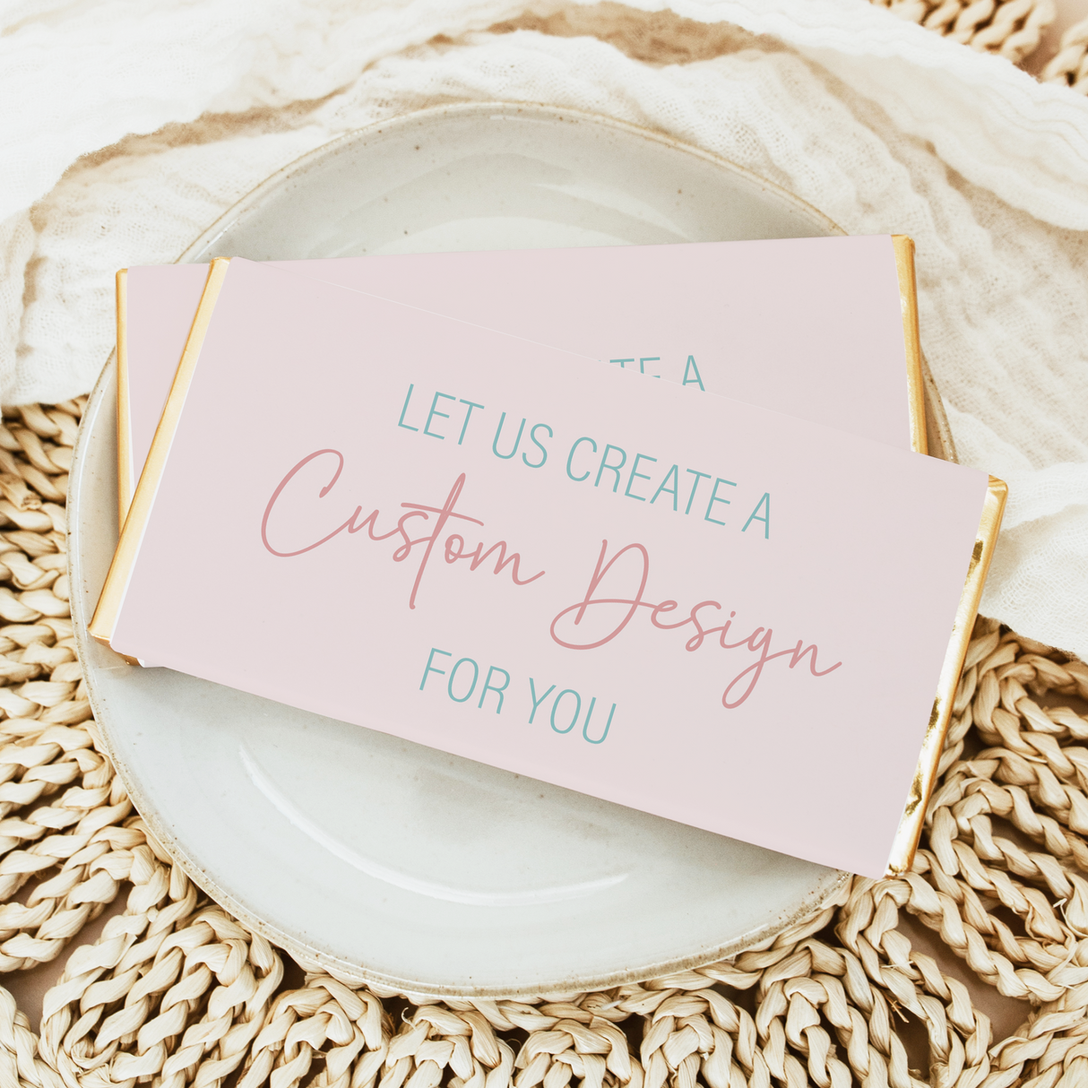 Folded printed chocolate bar wrapper with pastel “Let us create a Custom Design for you” text