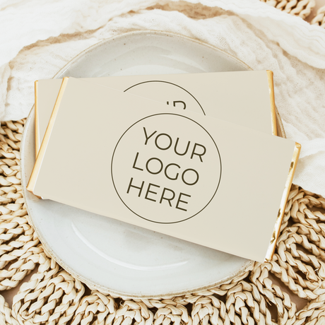 Cream custom chocolate bar wrappers with circular YOUR LOGO HERE logo text