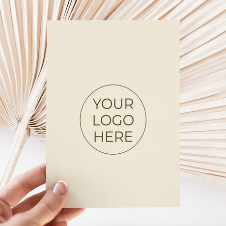 Cream chocolate bar wrapper with round logo placeholder: YOUR LOGO HERE
