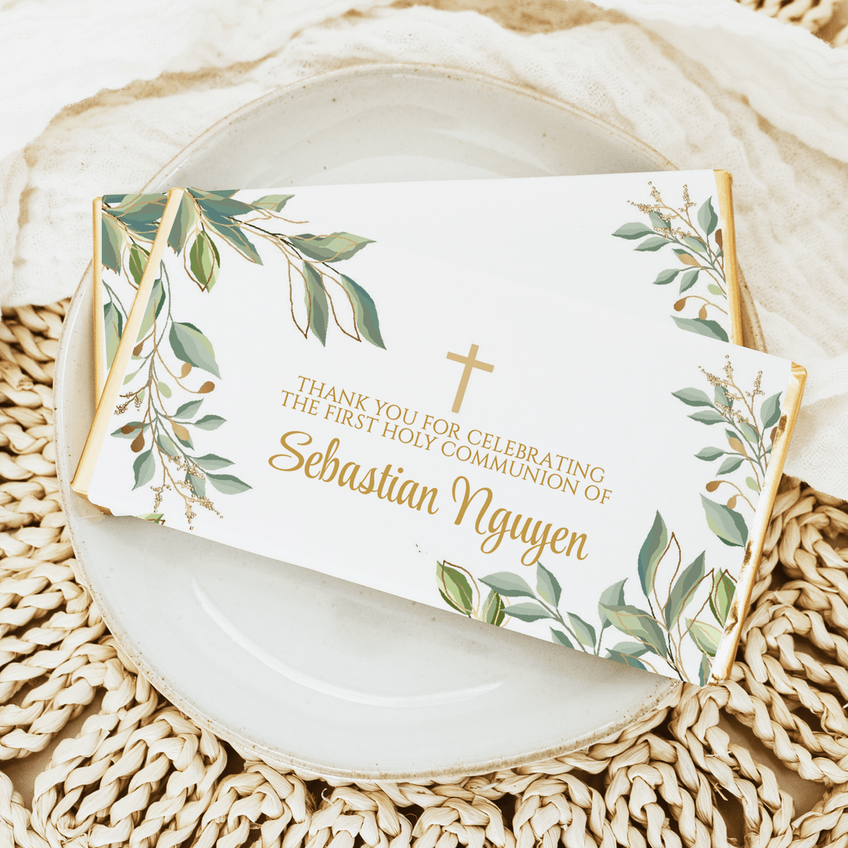 Custom confirmation chocolate bar wrapper with eucalyptus leaves and gold cross