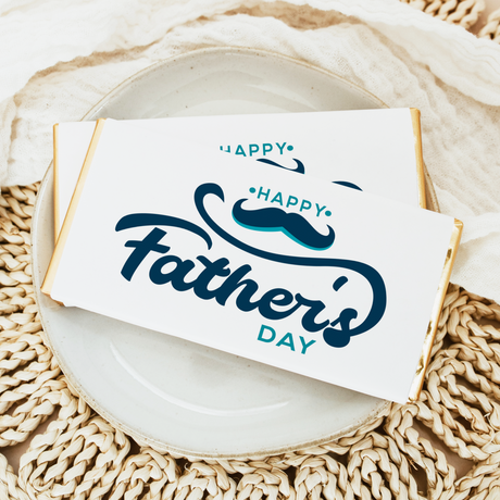Father's Day chocolate bar with white wrapper, 'Happy Father's Day' and mustache design