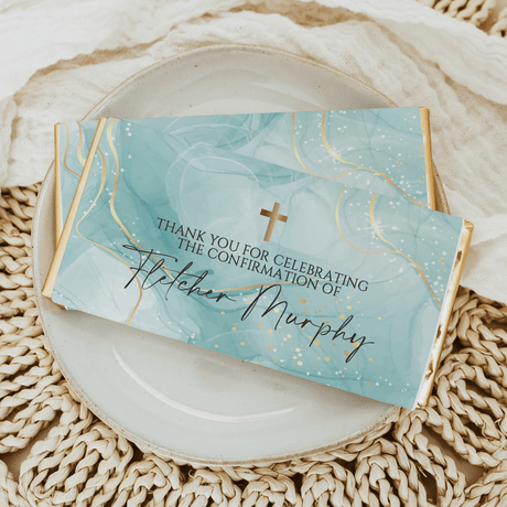 Custom confirmation chocolate bar wrappers with blue marble design, cross, and thank-you text