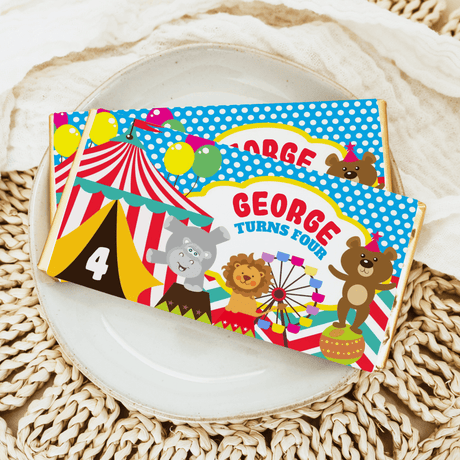 Circus birthday chocolate bar with animal banner and “Georgie turns four” text